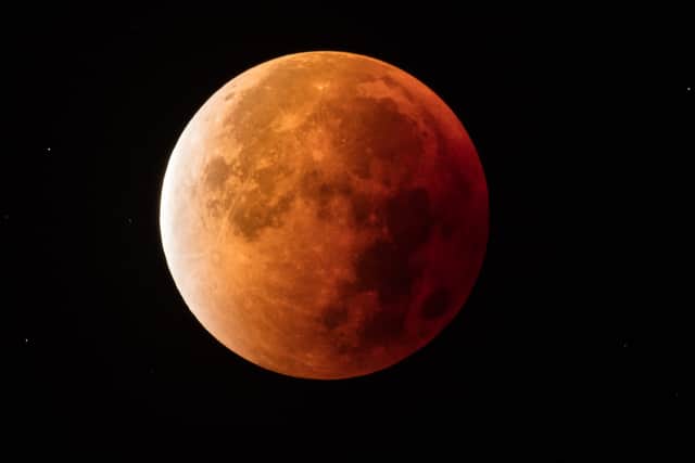 A full eclipse of the moon ends as the moon leaves the shadow of the Earth in September 2015 (Photo: Matt Cardy/Getty Images)