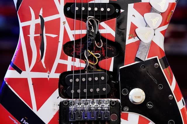 A EVH Fender "Frankenstrat" guitar stage played by Eddie Van Halen is on display during a press preview November 15, 2021 in New York to promote Julien's Auctions Icons & Idols: Rock N Roll auction that will take place November 19th and 20th. Picture: Timothy A. Clary / AFP)