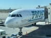 Frontier Airlines: Woman charged after flashing 'her anus and genitalia' and 'squatting as if to urinate' in aisle of plane