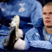 Erling Haaland looks on from the substitutes bench prior to the match between Manchester City and Burnley (Photo: Naomi Baker/Getty Images)