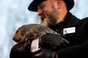 Groundhog Day 2024: Groundhog handler AJ Dereume holds Punxsutawney Phil (Photo: Michael Swensen/Getty Images)