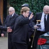 Sir Elton John and David Furnish leave the funeral service of Derek Draper at St Mary the Virgin church in Primrose Hill, north west London. Photo by Jonathan Brady/PA Wire