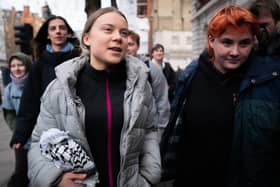 Climate campaigner Greta Thunberg (left) outside Westminster Magistrates' Court on Friday (Photo: James Manning/PA Wire)
