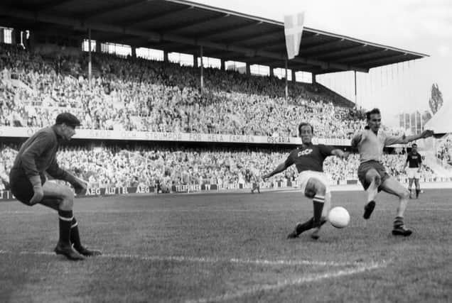 Kurt Hamrin (R) battles for the ball with a Soviet defender in front of goalkeeper Lev Yashin (L) during the World Cup quarterfinal soccer match between Sweden and the USSR on 19 June 1958 in Stockholm (Photo: STAFF/AFP via Getty Images)