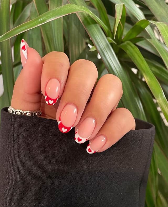 The dipped in hearts nail trend. Photo by Instagram.