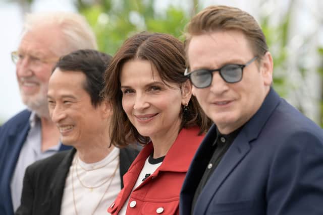 (L-R) Pierre Gagnaire, Director Tran Anh Hung, Juliette Binoche and Benoit Magimel attend the "La Passion De Dodin Bouffant" photocall at the 76th annual Cannes Film Festival at Palais des Festivals on May 25, 2023 in Cannes, France. (Photo by Kristy Sparow/Getty Images)