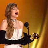 Pop megastar Taylor Swift celebrated her historic Grammy Award win by announcing a surprise new album. (Credit: AFP via Getty Images)