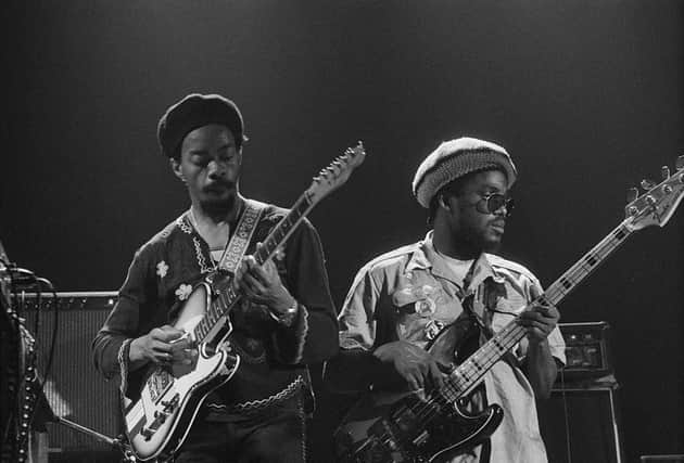 Legendary bassist Aston Barrett and bandleader with Bob Marley has passed away at 77. Guitarist Earl 'Chinna' Smith (left) and bassist Aston Barrett performing with Jamaican reggae group Bob Marley And The Wailers, at the Hammersmith Odeon, London, during the Rastaman Vibration Tour, 18th June 1976.