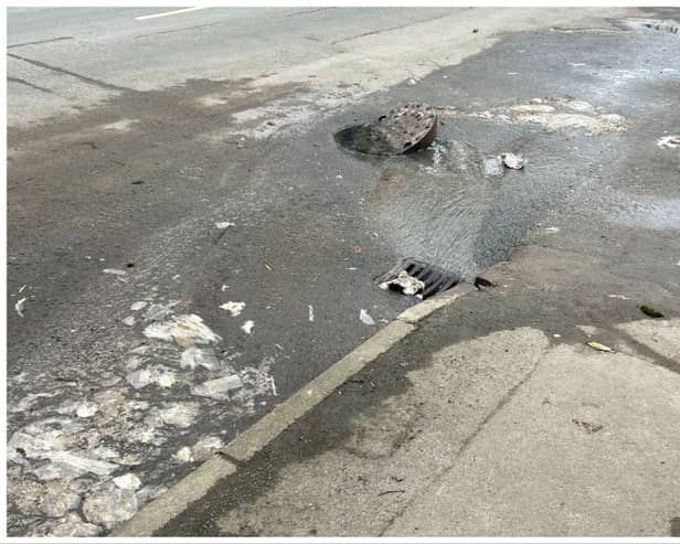 Toilet paper was strewn across a street in Kilham as well as murky brown water seeping out of a manhole cover. (Credit: Paul Jennings)