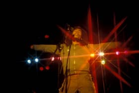 Bob Marley performing on stage at the West Coast Rock Show, Ninian Park in Cardiff, Wales, 19th June 1976. (Photo by Watal Asanuma/Shinko Music/Getty Images)