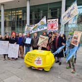 Protesters from River Action outside the court in Cardiff as they bring a judicial review against the Environment Agency for allowing agricultural run-off to pollute the River Wye