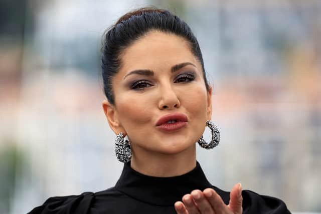 Canadian actress Sunny Leone poses during a photocall for the film "Kennedy" at the 76th edition of the Cannes Film Festival in Cannes, southern France, on May 25, 2023. (Photo by Valery HACHE / AFP)