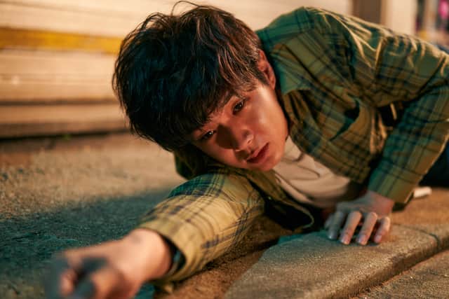 Choi Woo-sik as Lee Tang in A Killer Paradox