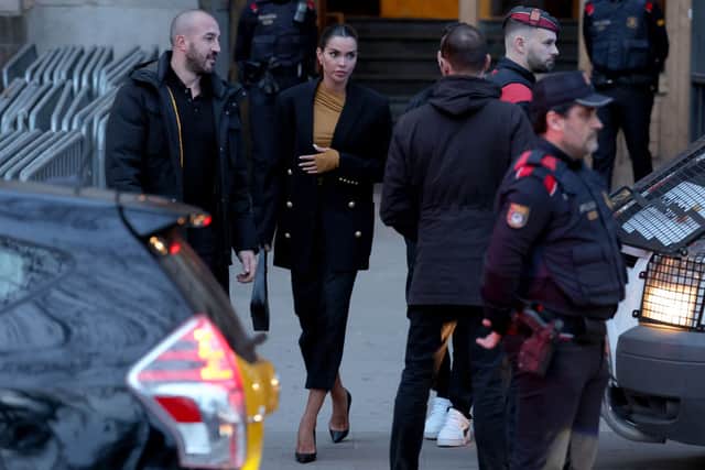  Spanish model and wife of Dani Alves, Joana Sanz (C) leaves on the second day of the Brazilian footballer trial at the High Court of Justice of Catalonia in Barcelona, on February 6, 2024.  (Photo by LLUIS GENE / AFP) 
