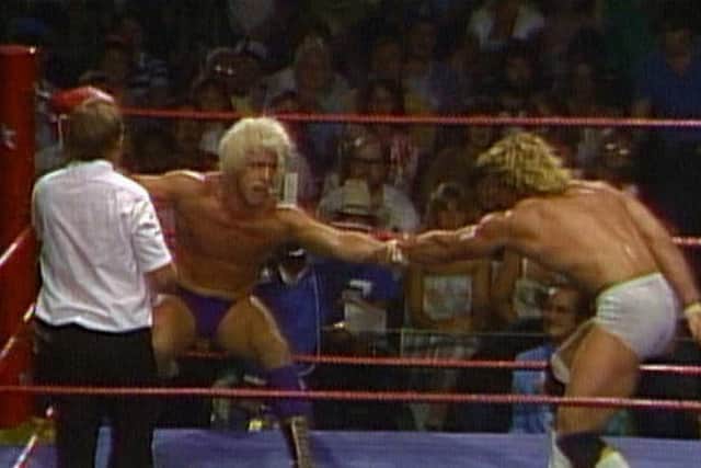 The war between then NWA Heavyweight Champion, Ric Flair, and Kerry Von Erich spilled across many territories, but it was in WCCW where the most intense of their battles occured (Credit: WWE)