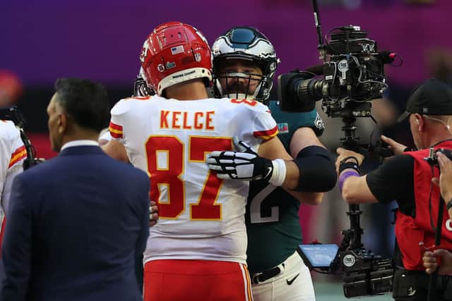 The two Kelce brothers share  a hug ahead of the 2023 Super Bowl final