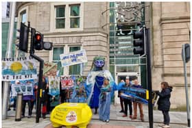 Protesters outside Cardiff's Civil Justice Centre before a judicial review review held to determine whether Defra and the Environment Agency are properly protecting the River Wye from agricultural pollution Picture: Isabella Boneham