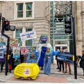 Protesters outside Cardiff's Civil Justice Centre before a judicial review review held to determine whether Defra and the Environment Agency are properly protecting the River Wye from agricultural pollution Picture: Isabella Boneham