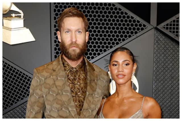 Calvin Harris' house in Los Angeles caught fire, resulting in $100,000 damage. Here he is with wife Vick Hope at this year's Grammys