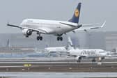 A Lufthansa passenger has reportedly died after coughing up blood mid-flight