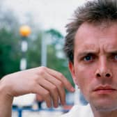 Portrait of British comedian and actor Rik Mayall (1958 - 2014) in Covent Garden, London, mid 1980s. (Photo by Steve Rapport/Getty Images)