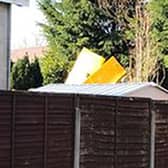 The small plane crashed into the back garden of a house