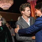 Actors Austin Butler (L) and Tom Cruise arrive at the 95th Annual Oscars Nominees Luncheon at The Beverly Hilton on February 13, 2023 in Beverly Hills, California. (Photo by VALERIE MACON / AFP)