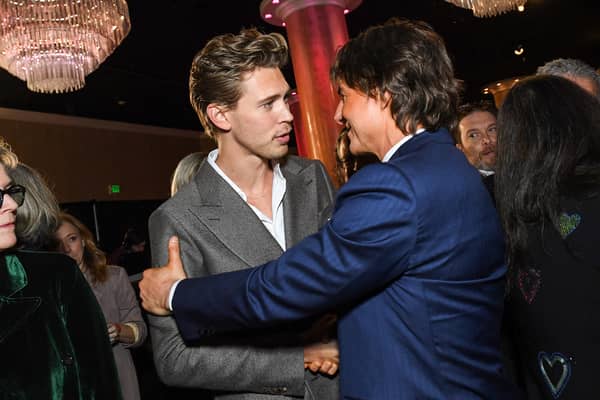 Actors Austin Butler (L) and Tom Cruise arrive at the 95th Annual Oscars Nominees Luncheon at The Beverly Hilton on February 13, 2023 in Beverly Hills, California. (Photo by VALERIE MACON / AFP)