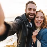The cute TikTok 'take a look at my girlfriend' trend has gone viral ahead of Valentine's Day. Stock image by Adobe Photos.
