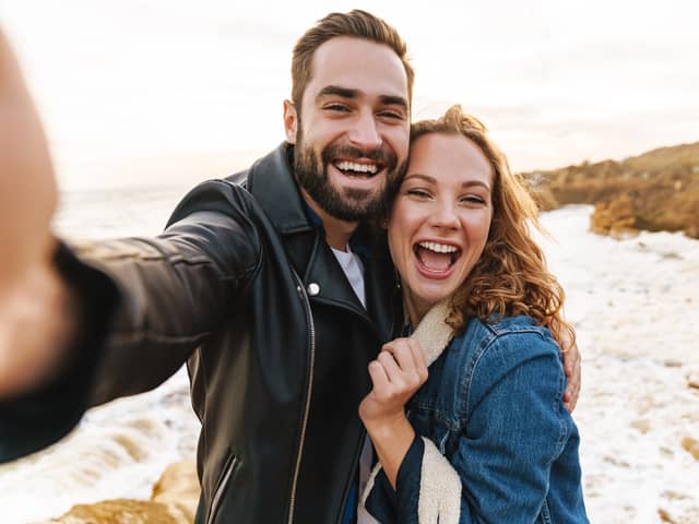The cute TikTok 'take a look at my girlfriend' trend has gone viral ahead of Valentine's Day. Stock image by Adobe Photos.