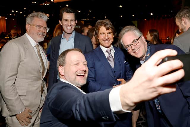 (L-R) Christopher McQuarrie, Joseph Kosinski, guest, Tom Cruise, and Eddie Hamilton attend the 95th Annual Oscars Nominees Luncheon at The Beverly Hilton on February 13, 2023 in Beverly Hills, California. (Photo by Frazer Harrison/Getty Images)