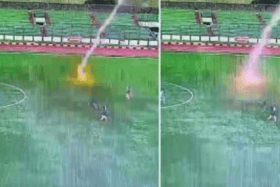 Shocking video captured the moment Septain Raharja, 35, collapsed at Siliwangi Stadium in Bandung, West Java on Saturday afternoon (February 10) after being struck by lightning. 