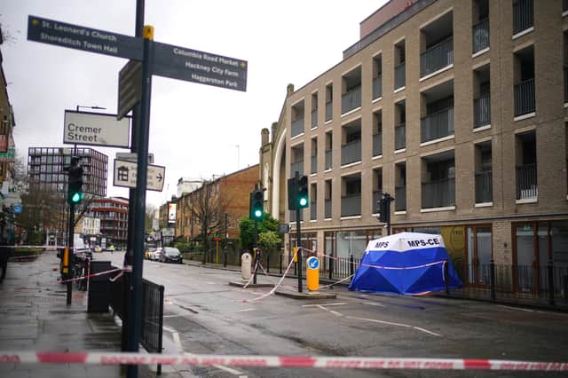 A police forensic tent in Shoreditch, east London near to the scene where a 17-year-old boy has died after being stabbed Picture: Victoria Jones/PA Wire 