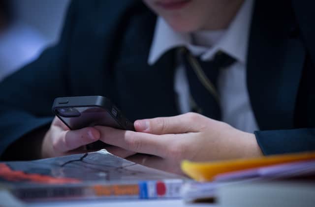 New guidance from the government could see the use of mobile phones by school pupils during the school day banned. (Credit: Getty Images)