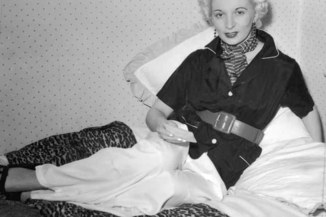 Night club manageress Ruth Ellis (1926 - 1955) poses for one Captain Ritchie, 1954. The setting is probably the flat above her club on the Brompton Road in Knightsbridge, London. In 1955, Ellis was convicted of the murder of her lover, David Blakely, and hanged at Holloway Prison, becoming the last woman to receive the death penalty in Britain. (Photo by Hulton Archive/Getty Images) 