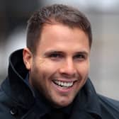 Dan Wootton said he has been "completely cleared" of criminal allegations made against him 