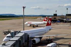 Five airport workers have been hospitalised after a suspected radioactive substance leaked from a suitcase on board a Swiss Air plane. (Photo: AFP via Getty Images)