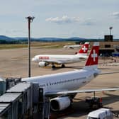 Five airport workers have been hospitalised after a suspected radioactive substance leaked from a suitcase on board a Swiss Air plane. (Photo: AFP via Getty Images)