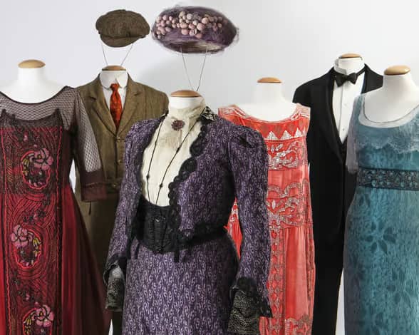 Some of the TV and film costumes which are going to be sold at auction for charity. Pictured are outfits from "Downtown Abbey". Photo by Lightscamera.auction and Kerry Taylor Auctions.