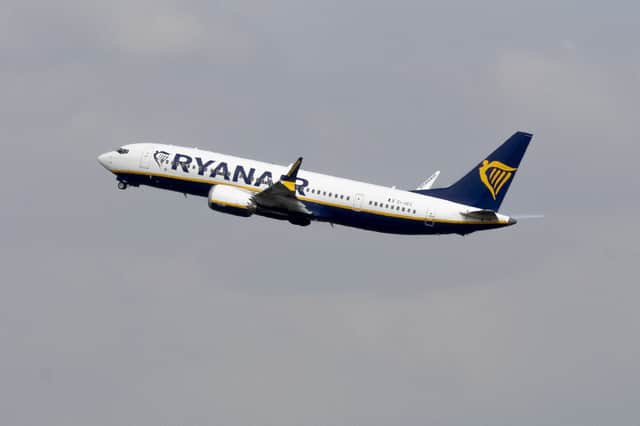 Two men were hauled off a Ryanair flight from Edinburgh Airport to Tenerife after a shocking brawl broke out mid-air. (Photo: Belga/AFP via Getty Images)