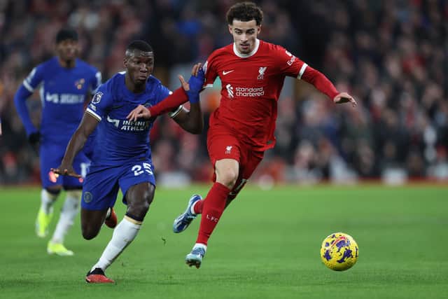 Curtis Jones of Liverpool on the ball under pressure from Moises Caicedo of Chelsea during the Premier League match between Liverpool FC and Chelsea FC at Anfield on January 31, 2024 in Liverpool, England. (Photo by Clive Brunskill/Getty Images)