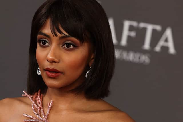 British actress Charithra Chandran poses on the red carpet upon arrival at the BAFTA British Academy Film Awards at the Royal Festival Hall, Southbank Centre, in London, on February 18, 2024. (Photo by Adrian DENNIS / AFP)