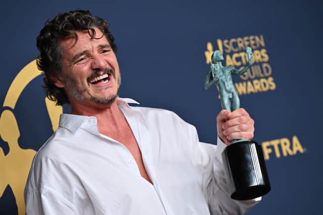 Chilean-US actor Pedro Pascal poses in the press room with the award for Outstanding Performance by a Male Actor in a Drama Series for "The Last of Us" during the 30th Annual Screen Actors Guild awards at the Shrine Auditorium in Los Angeles, February 24, 2024. (Photo by Robyn BECK / AFP)