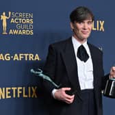 Irish actor Cillian Murphy poses in the press room with the awards for Outstanding Performance by a Male Actor in a Leading Role in a Motion Picture and Outstanding Performance by a Cast in a Motion Picture for "Oppenheimer" during the 30th Annual Screen Actors Guild awards at the Shrine Auditorium in Los Angeles, February 24, 2024. (Photo by Robyn BECK / AFP)