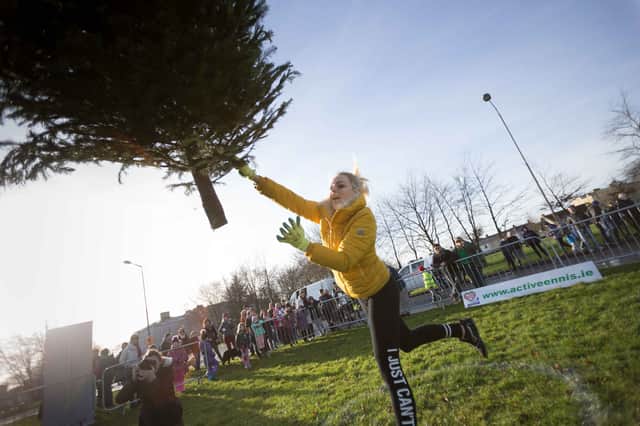 A woman tried to sue her insurance company for £650,000 after claiming she lost out on work after she was severely injured in a car crash - only to be pictured winning a Christmas tree throwing competition. Picture: Eamon Ward / SWNS