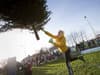 Woman sued insurance company for £650k due to debilitating injures - before being pictured winning Christmas tree throwing competition