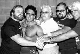 Ole Anderson (far left) with the iconic wrestling group The Four Horsemen. Anderson has died at the age of 81, leaving only four members of the original group alive (Credit: WWE/PWI)