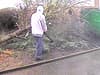 Hooded man caught on camera chopping down tree over 'row with birdfeeders' as homeowners left 'terrified'