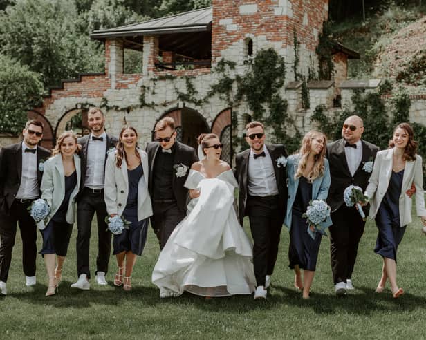 6 rules of what to wear to a spring wedding by a personal stylist as wedding season 2024 begins. Stock image by Adobe Photos.