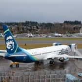 Three passengers on board the Alaska Airlines flight that saw a door plug blow out are suing the airline and Boeing for $1bn. (Photo: AFP via Getty Images)